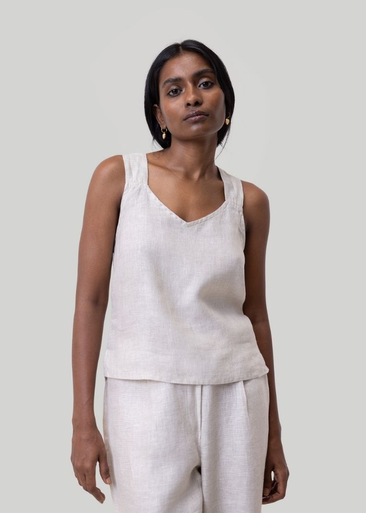 A Model Wearing White Linen Crossback button up tank top White, curated by Only Ethikal