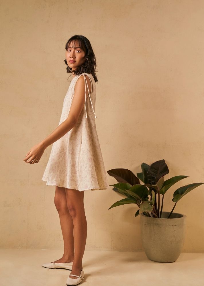 A Model Wearing White Organic Cotton The Coral Tide handwoven dress, curated by Only Ethikal