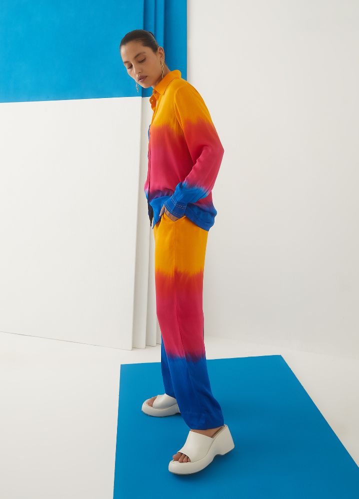 A Model Wearing  Tie And Dye Multicolor Bemberg Sunset Tie Dye Shirt And Trousers, curated by Only Ethikal
