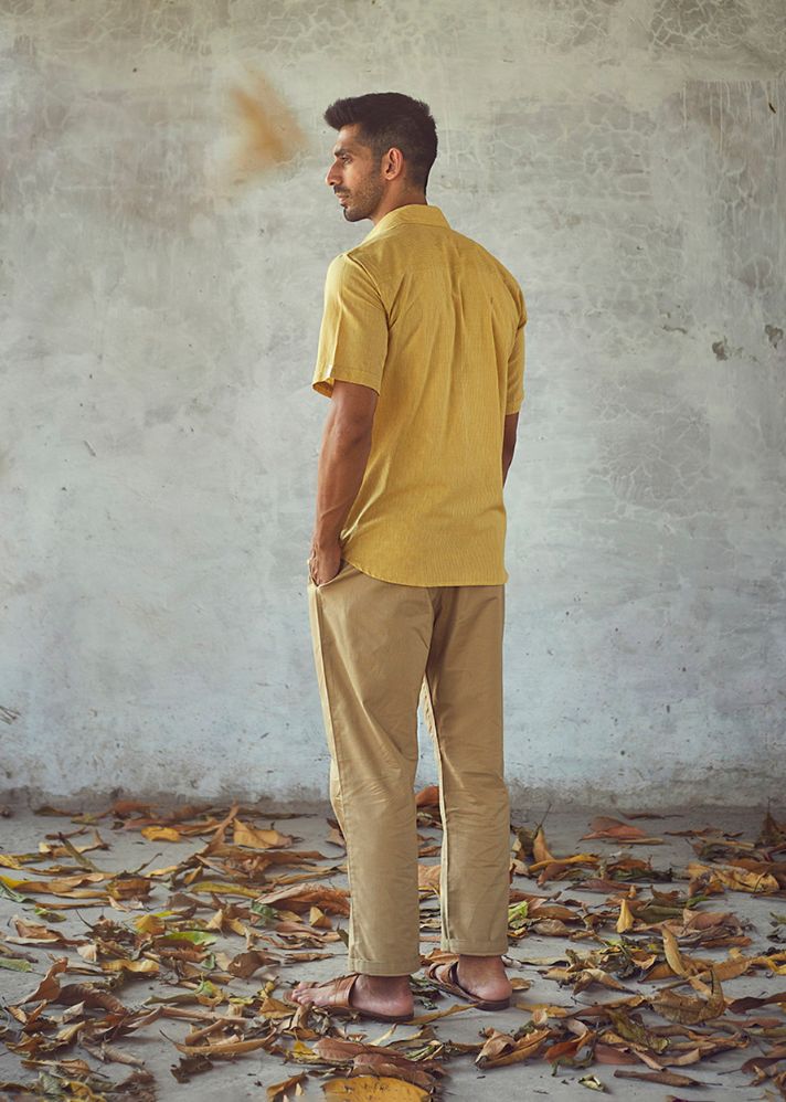 A Model Wearing Yellow Pure Cotton Butter Milk Shirt, curated by Only Ethikal