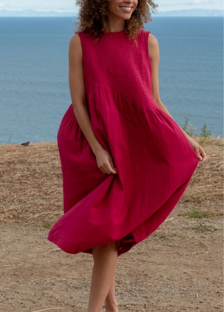 A Model Wearing Pink Handwoven Cotton Fuchsia pink pleated dress, curated by Only Ethikal