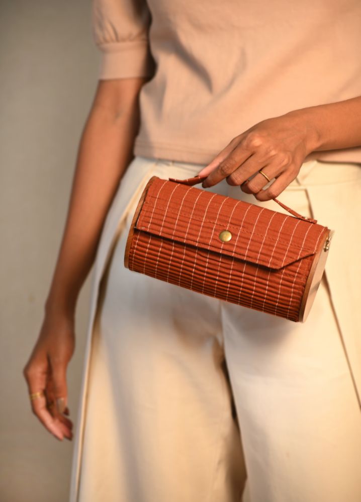 A Brown Earthen Hue Round Clutch, curated by Only Ethikal