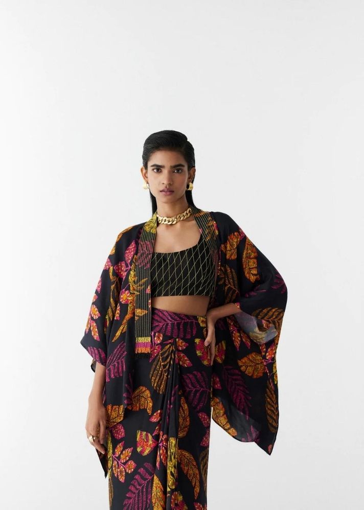 A Model Wearing Multicolor Organic Cupro Rain Forest Knot Style Skirt With Blouse, curated by Only Ethikal