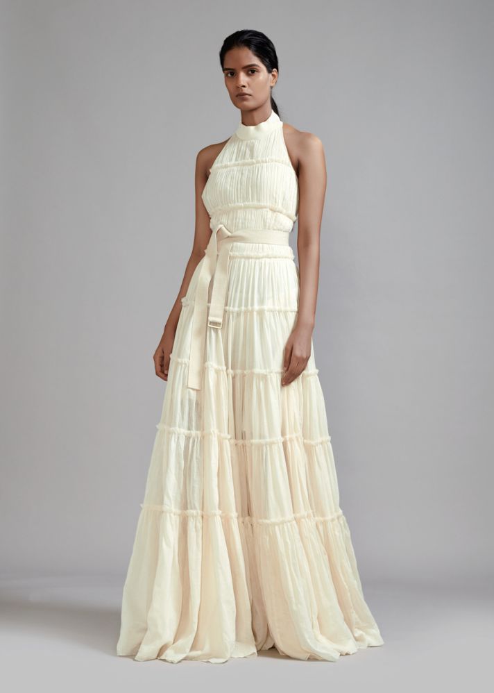 A Model Wearing White  Handwoven cotton Off-White Backless Tiered Gown, curated by Only Ethikal