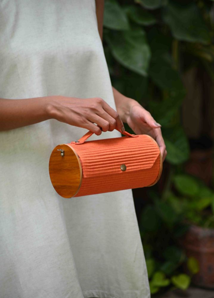 A Orange Saffron Sun Round Clutch, curated by Only Ethikal
