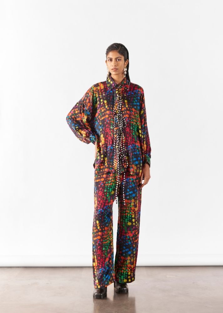 A Model Wearing Multicolor Organic Cupro Wildflower Knot Shirt And Pants Co-Ord, curated by Only Ethikal