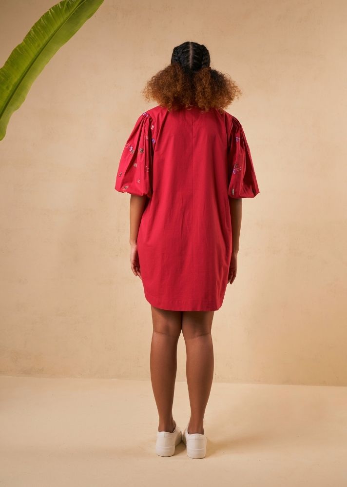 A Model Wearing Red Organic Cotton Coral Sunset organic cotton dress, curated by Only Ethikal