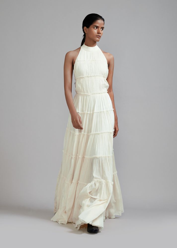 A Model Wearing White  Handwoven cotton Off-White Backless Tiered Gown, curated by Only Ethikal