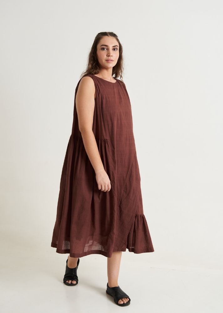 A Model Wearing Brown Handwoven Cotton Cocoa Brown Pleated Twirl Dress, curated by Only Ethikal