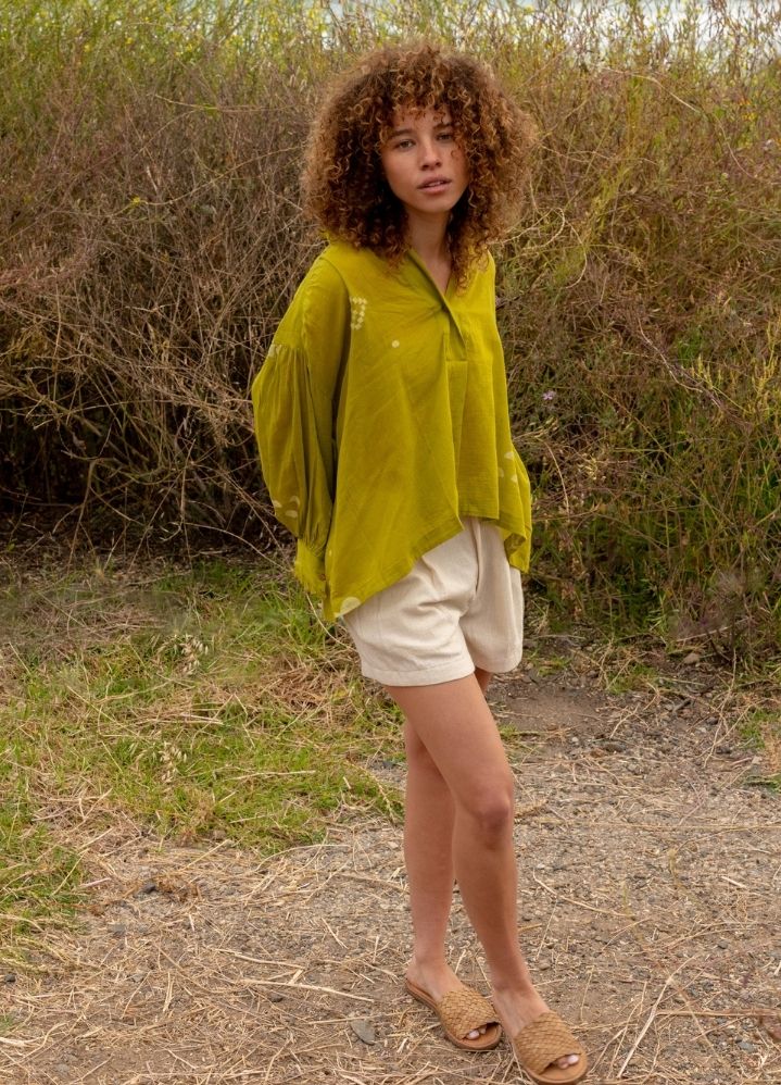 A Model Wearing Green Handwoven Cotton Juniper gathered shirt, curated by Only Ethikal