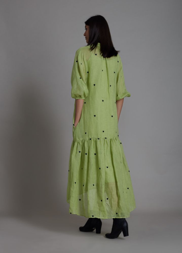 A Model Wearing Green Linen Tiny Heart Dress- Green, curated by Only Ethikal