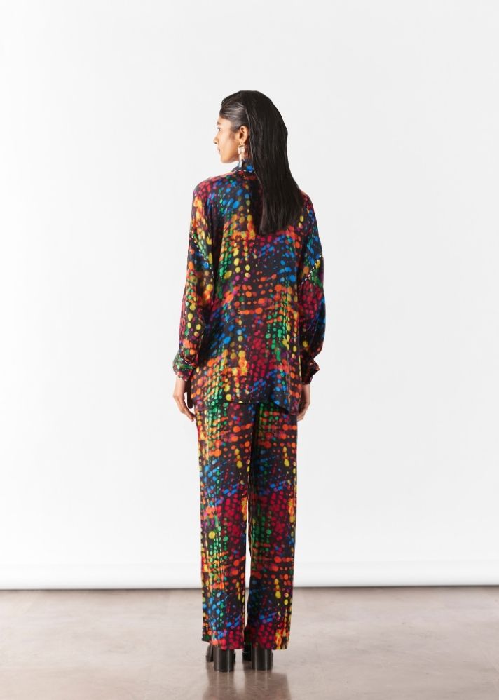 A Model Wearing Multicolor Organic Cupro Wildflower Knot Shirt And Pants Co-Ord, curated by Only Ethikal