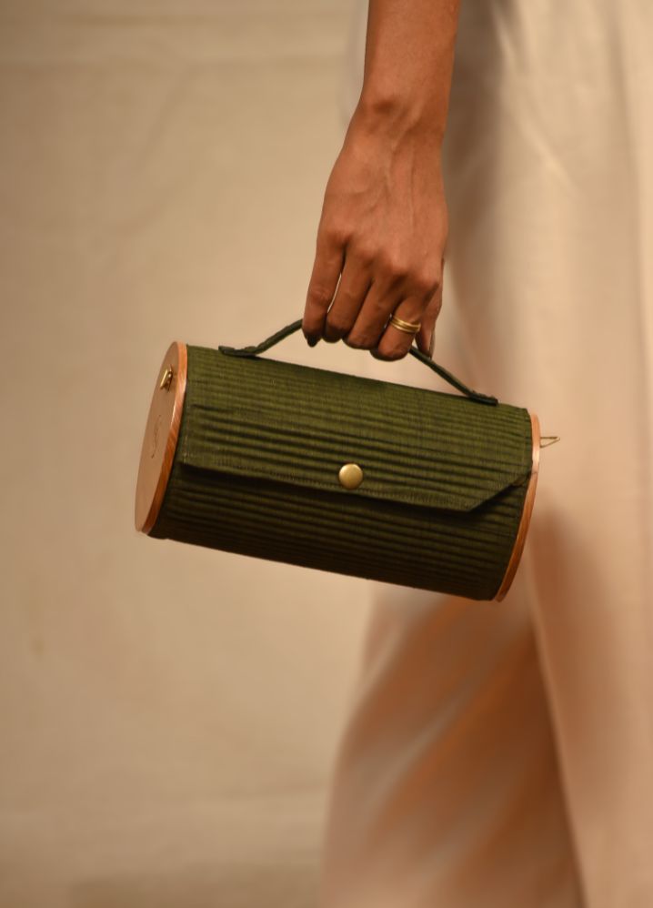 A Olive Summer Grove Round Clutch, curated by Only Ethikal
