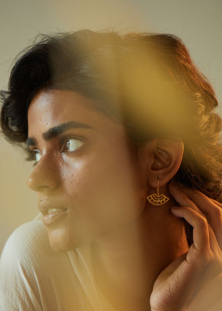 A Model Wearing Gold  Gold Plated Brass Kesar Ear Loops, curated by Only Ethikal