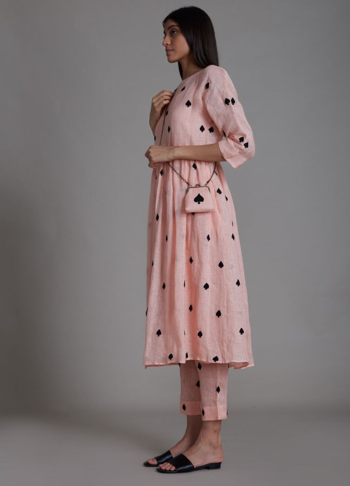 A Model Wearing Peach Linen Teen Patti Se Pants- Pink, curated by Only Ethikal