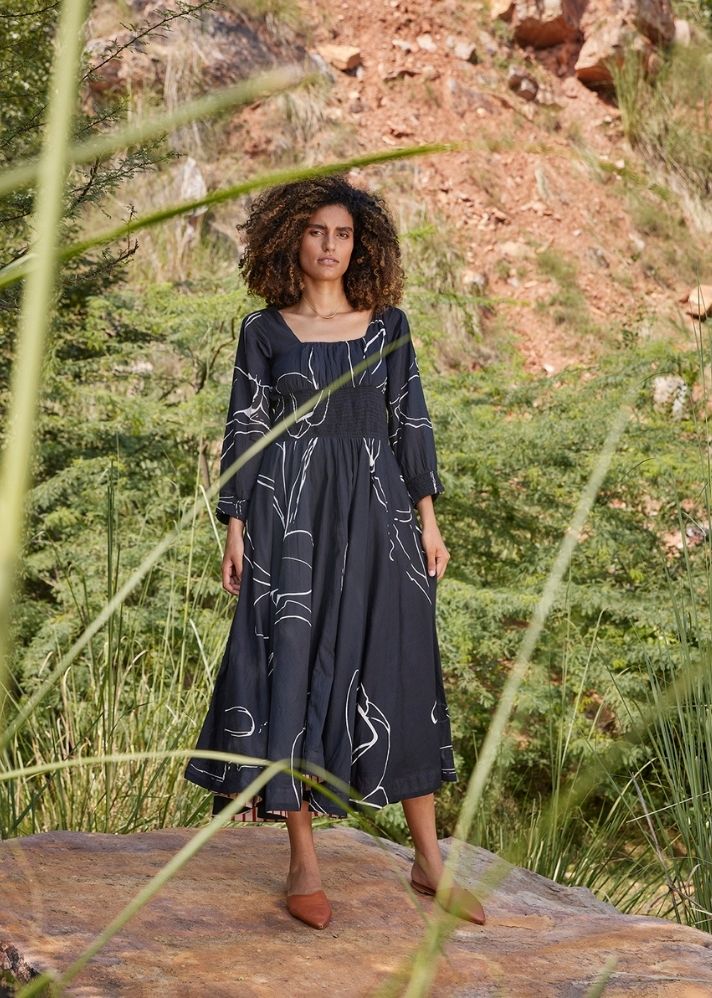 A Model Wearing Black Pure Cotton Under Her Gaze Midi Dress, curated by Only Ethikal