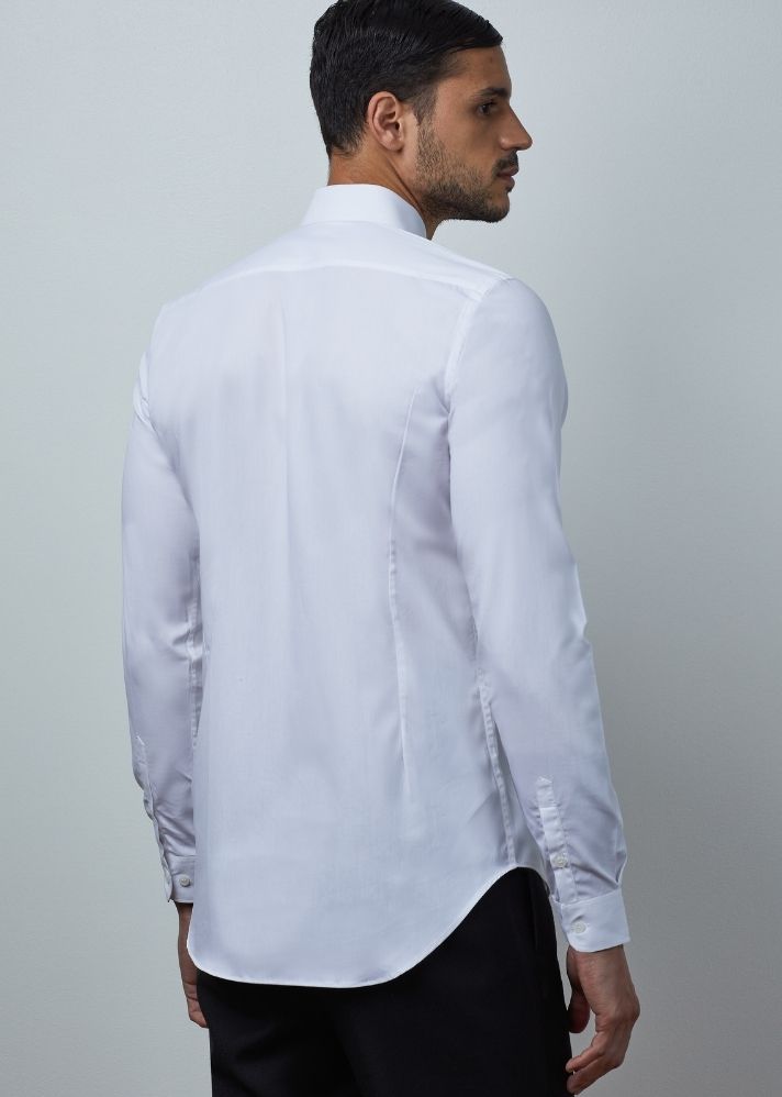 A Model Wearing White Pure Cotton THE MINAR SHIRT, curated by Only Ethikal