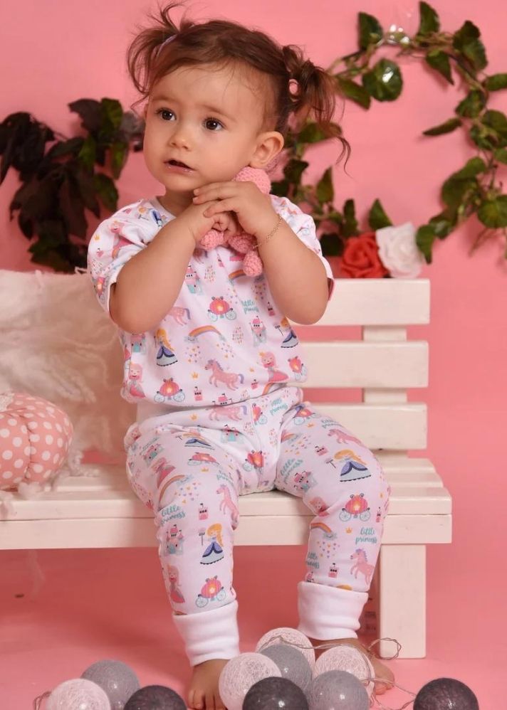 A Model Wearing Multicolor Organic Cotton Little Princess Organic 2-Piece Pjs Set, curated by Only Ethikal