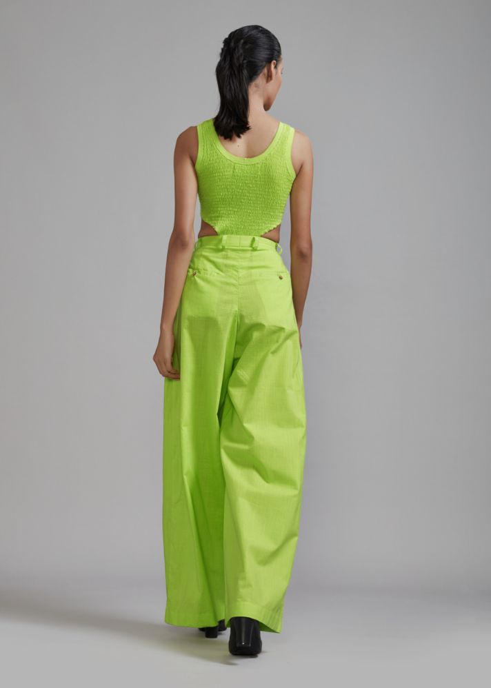 A Model Wearing Green  Handwoven cotton Neon Green Long Pleated Trouser, curated by Only Ethikal