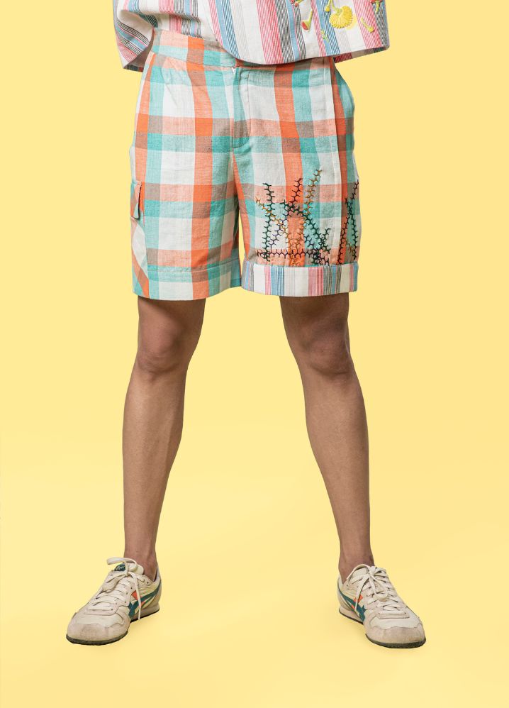 A model wearing Checkered Multicolor Handwoven Cotton Color Block Cuff Shorts, curated by Only Ethikal