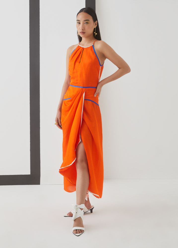 A Model Wearing  Orange Bemberg Lucy Skater Linen Dress, curated by Only Ethikal