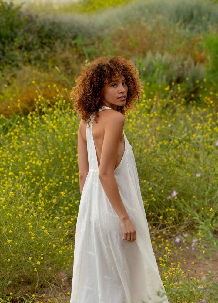 A Model Wearing White Handwoven Cotton Off white halter neck dress, curated by Only Ethikal