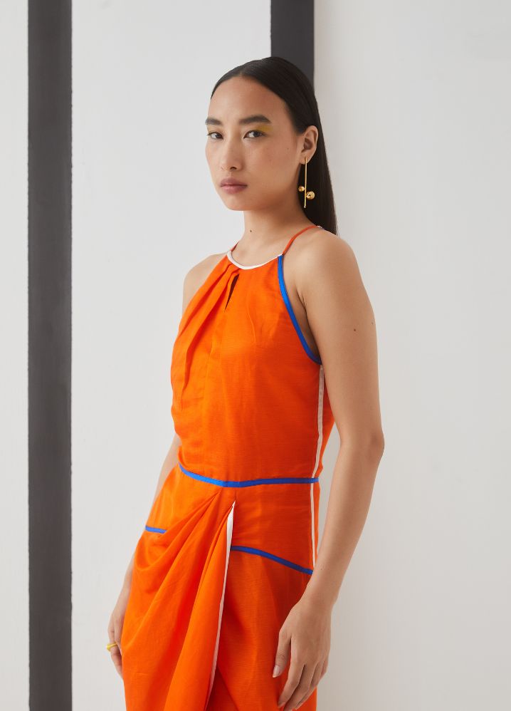 A Model Wearing  Orange Bemberg Lucy Skater Linen Dress, curated by Only Ethikal