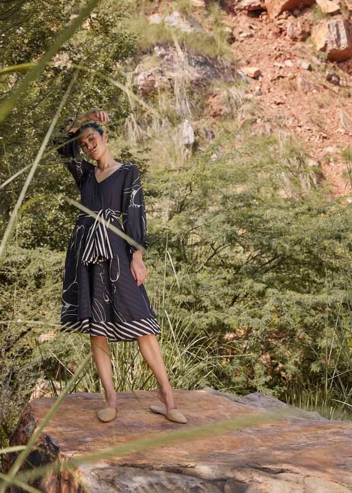 A Model Wearing Black Pure Cotton Secret Glimpse Dress, curated by Only Ethikal