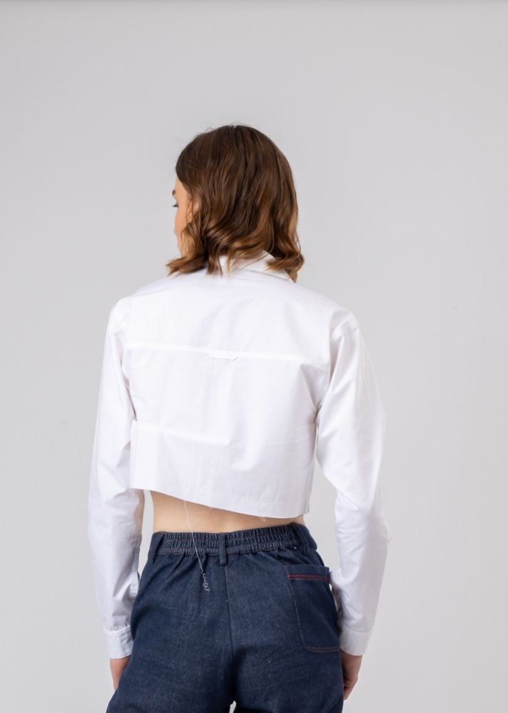 A Model Wearing White Upcycled Cotton Austin White Shirt, curated by Only Ethikal