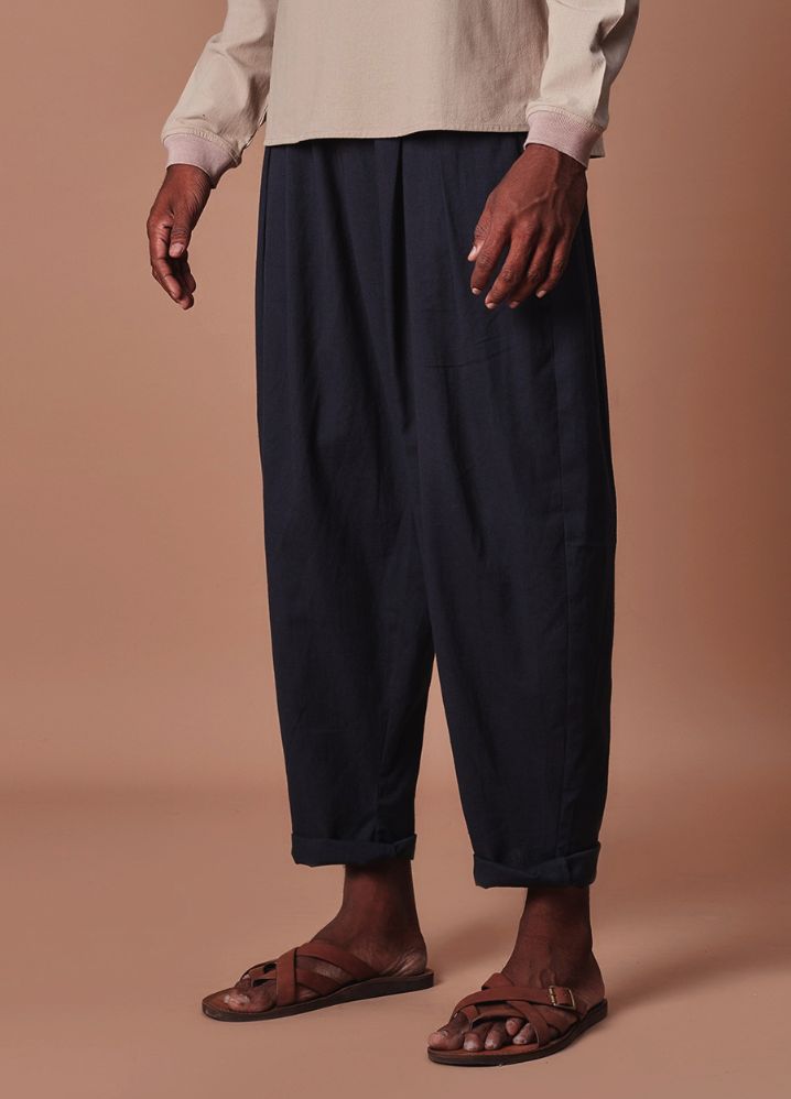 A Model Wearing  Black Pure Cotton Men's Charcoal Pleated Balloon Pants, curated by Only Ethikal