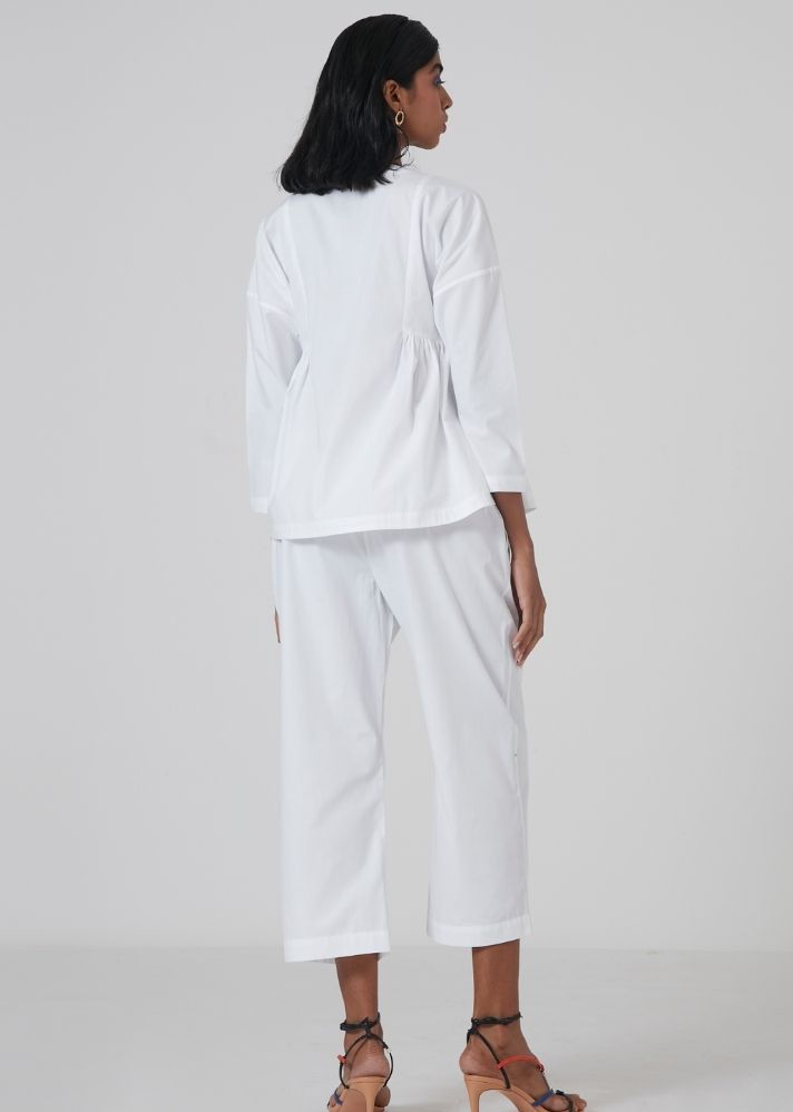 A Model Wearing White Organic Cotton Milo Set - White
, curated by Only Ethikal
