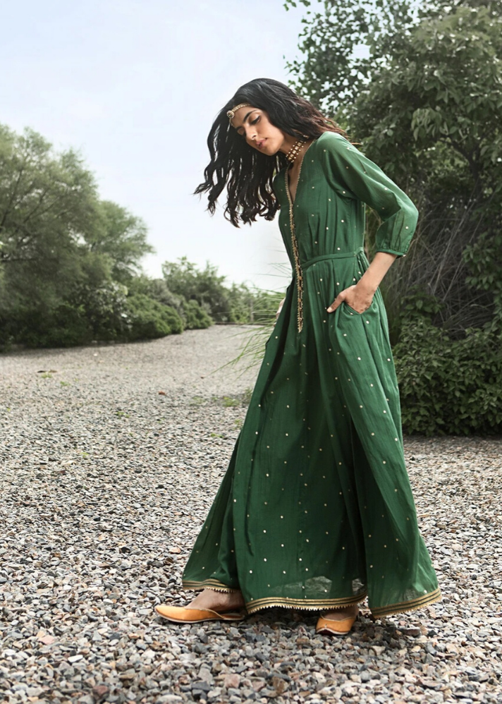 young woman in Green Ornamental dress made of sustainable materials by Kharakapas curated by onlyethikal