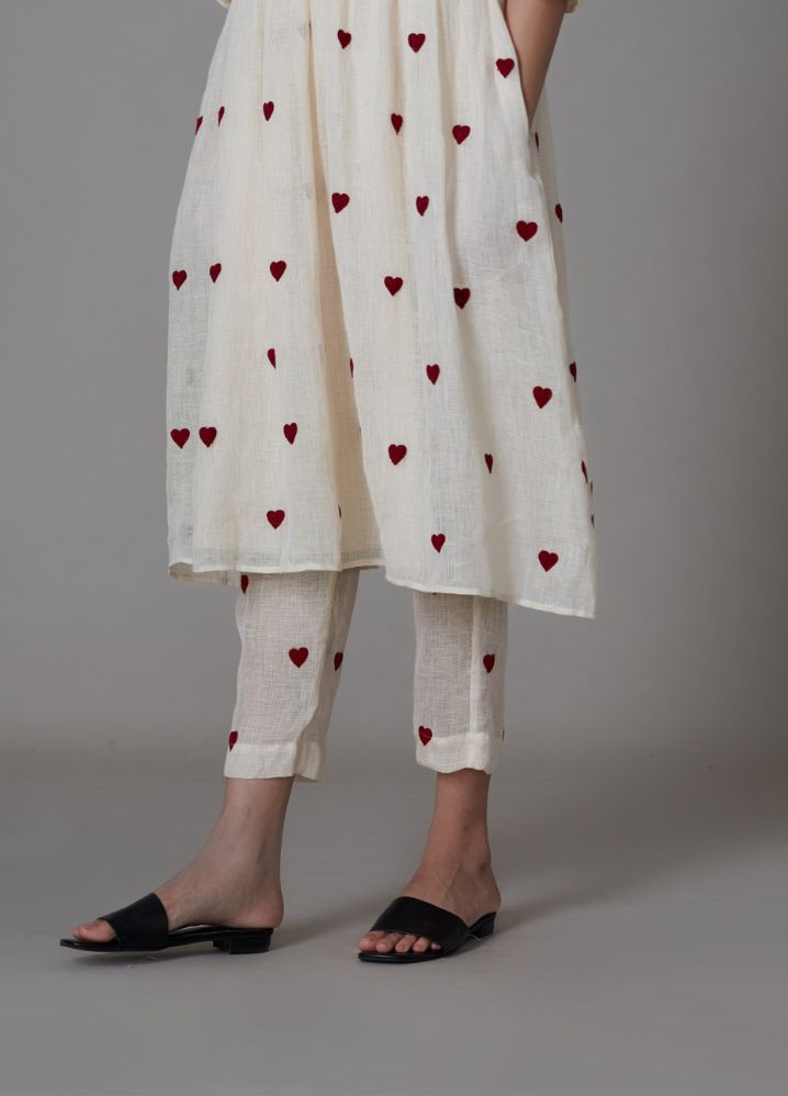 A Model Wearing White Linen Teen Patti Se Pants-Oatmeal, curated by Only Ethikal