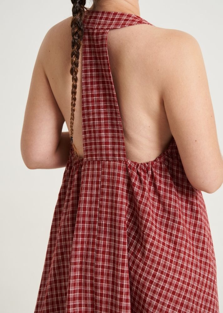 A Model Wearing Multicolor Handwoven Cotton Halter neck gingham dress, curated by Only Ethikal
