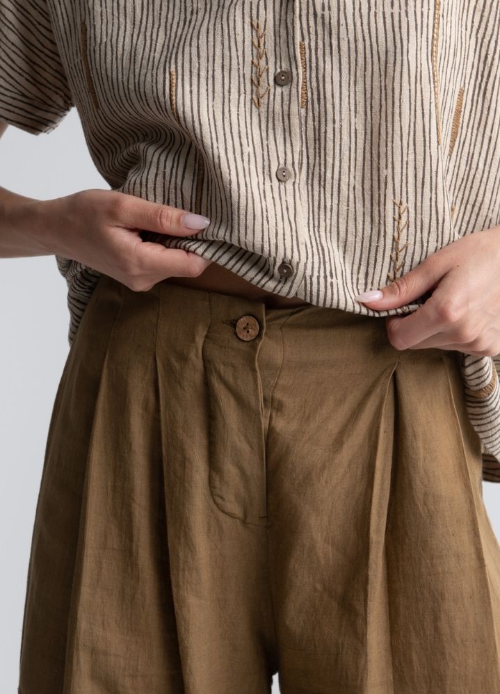A Model Wearing Brown Handwoven Cotton Relaxed Cotton Pants, curated by Only Ethikal