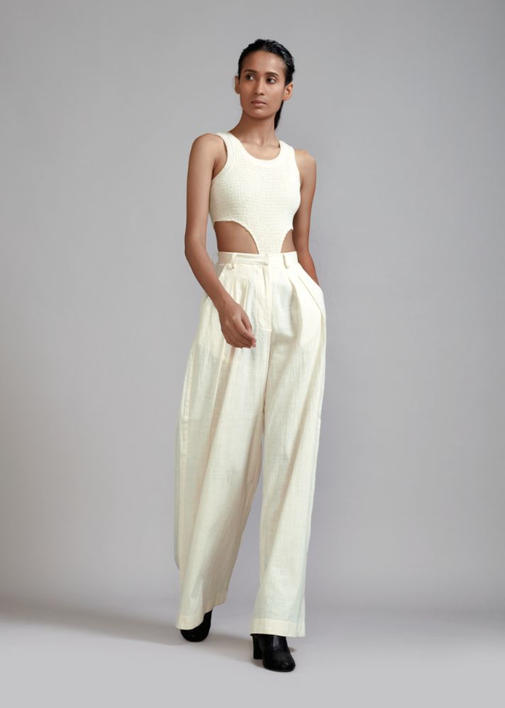 A Model Wearing White  Handwoven cotton Off-White Long Pleated Trouser, curated by Only Ethikal