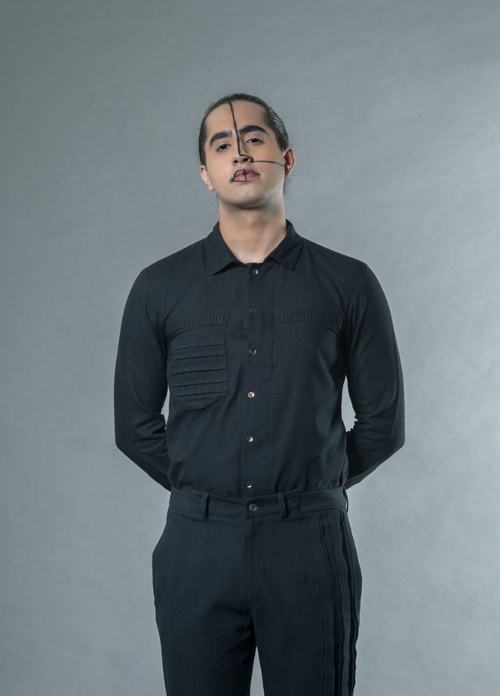 A model wearing  Black Handwoven Cotton Shirt With Cross Pleats Pocket, curated by Only Ethikal