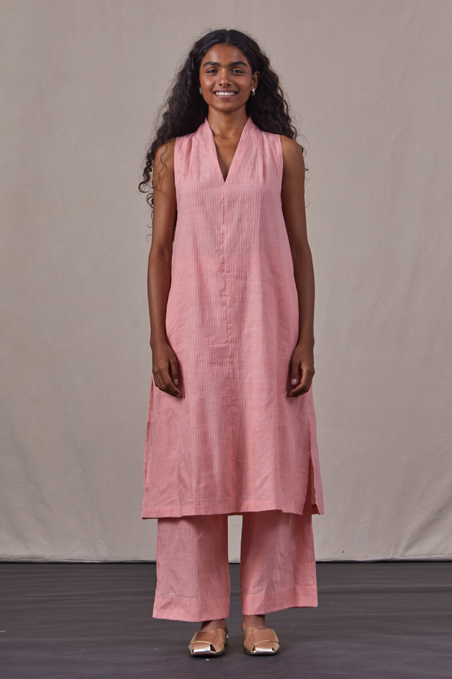 A Model Wearing Peach Handwoven Cotton Sudar Set, curated by Only Ethikal