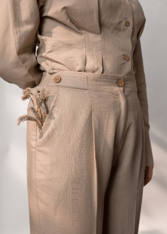 A Model Wearing Beige Hemp Tailored Pleated Pants, curated by Only Ethikal