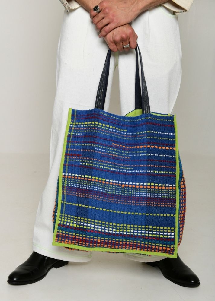 A Model Wearing Multicolor Handwoven Cotton Recycle Indigo Fumigo Bag, curated by Only Ethikal