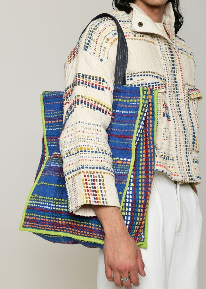 A Model Wearing Multicolor Handwoven Cotton Recycle Indigo Fumigo Bag, curated by Only Ethikal
