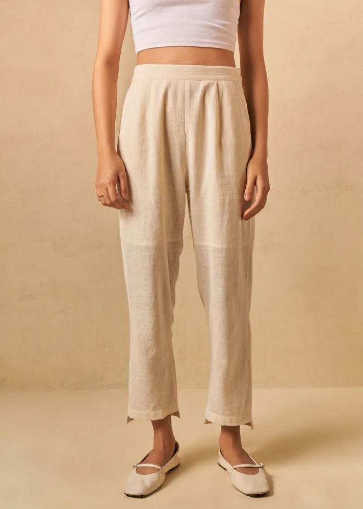A Model Wearing Beige Organic Cotton The Holiday handwoven trousers, curated by Only Ethikal