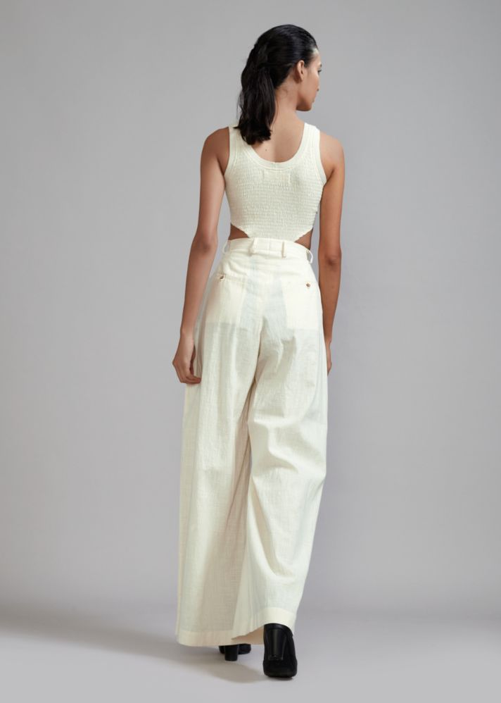 A Model Wearing White  Handwoven cotton Off-White Long Pleated Trouser, curated by Only Ethikal