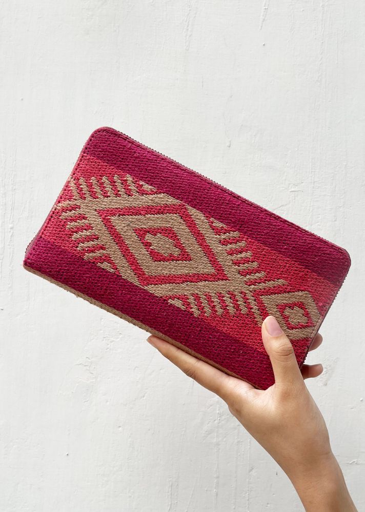 A Model Wearing Pink Handwoven Cotton Rasberry Wallet, curated by Only Ethikal