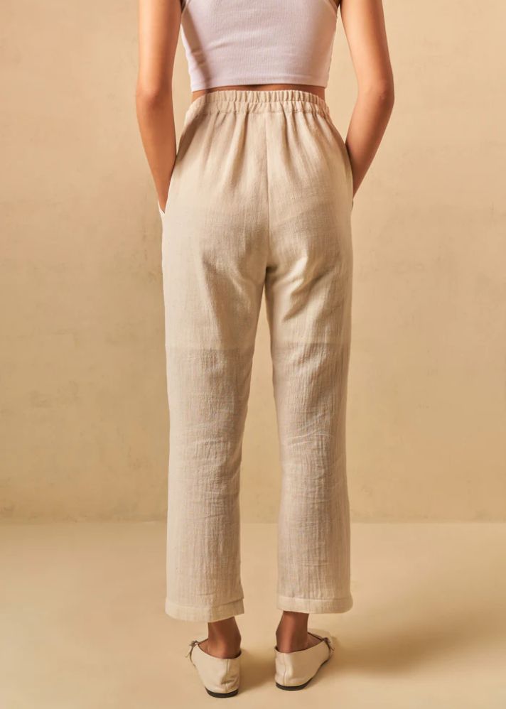 A Model Wearing Beige Organic Cotton The Holiday handwoven trousers, curated by Only Ethikal