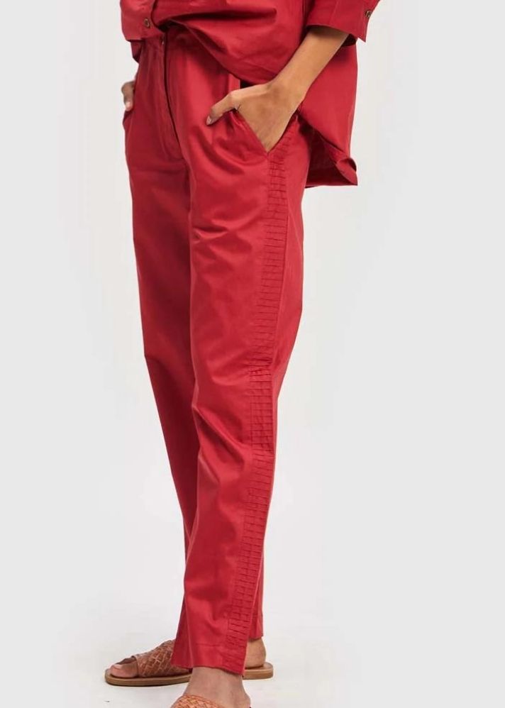 A Model Wearing Red Cotton The Everyday Pant Red, curated by Only Ethikal