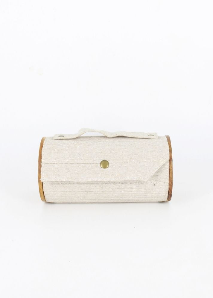 Product image of Multicolor Upcycled Cotton Oat & Cocoa Round Clutch - Changeable Sleeve, curated by Only Ethikal