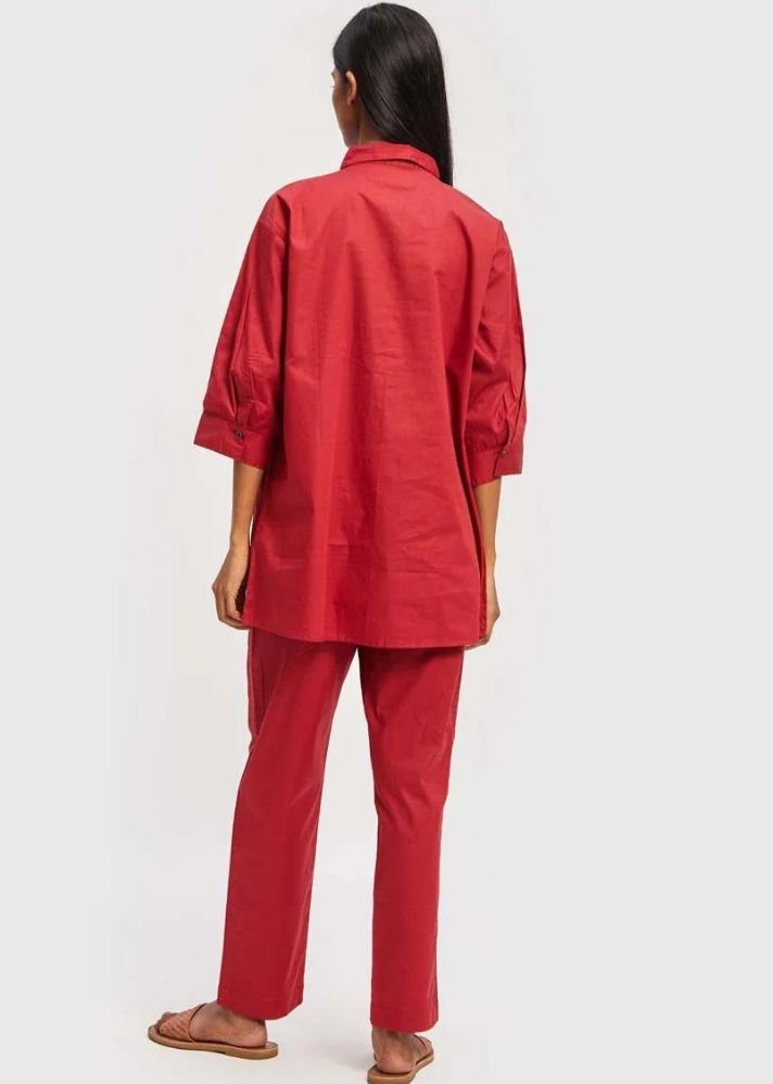 A Model Wearing Red Cotton The Everyday Pant Red, curated by Only Ethikal