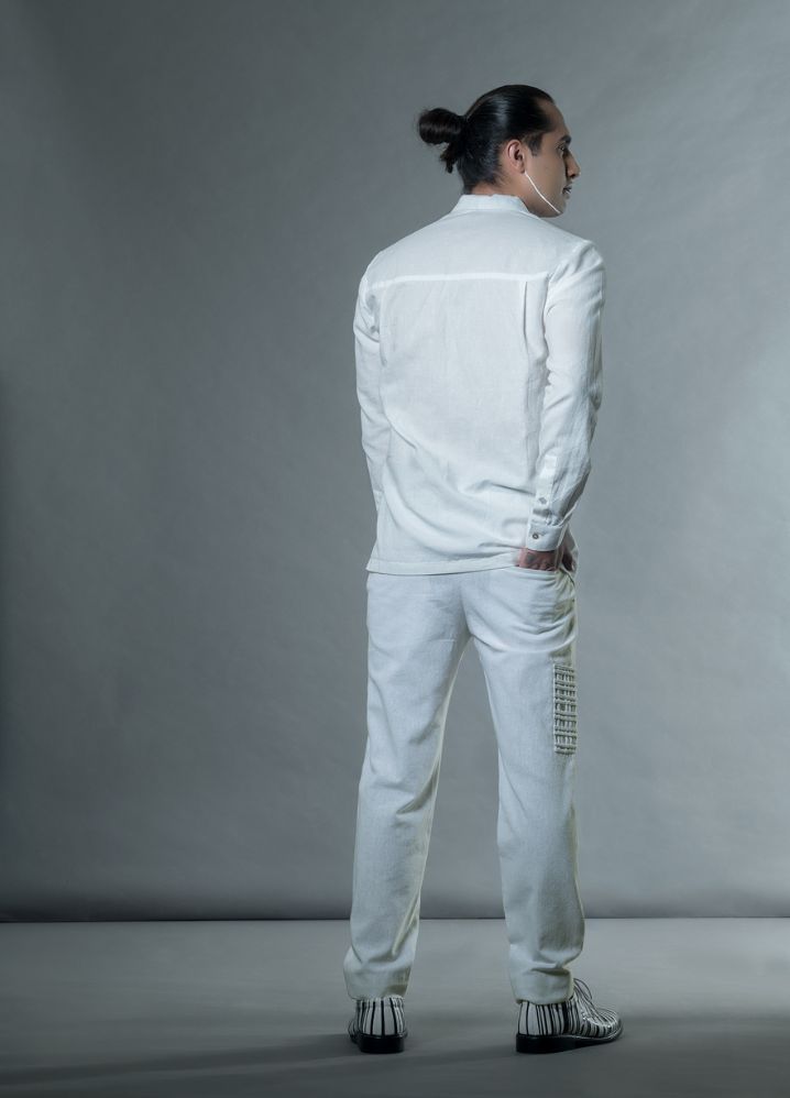 A model wearing  White Jute Pants With Mat Pocket, curated by Only Ethikal