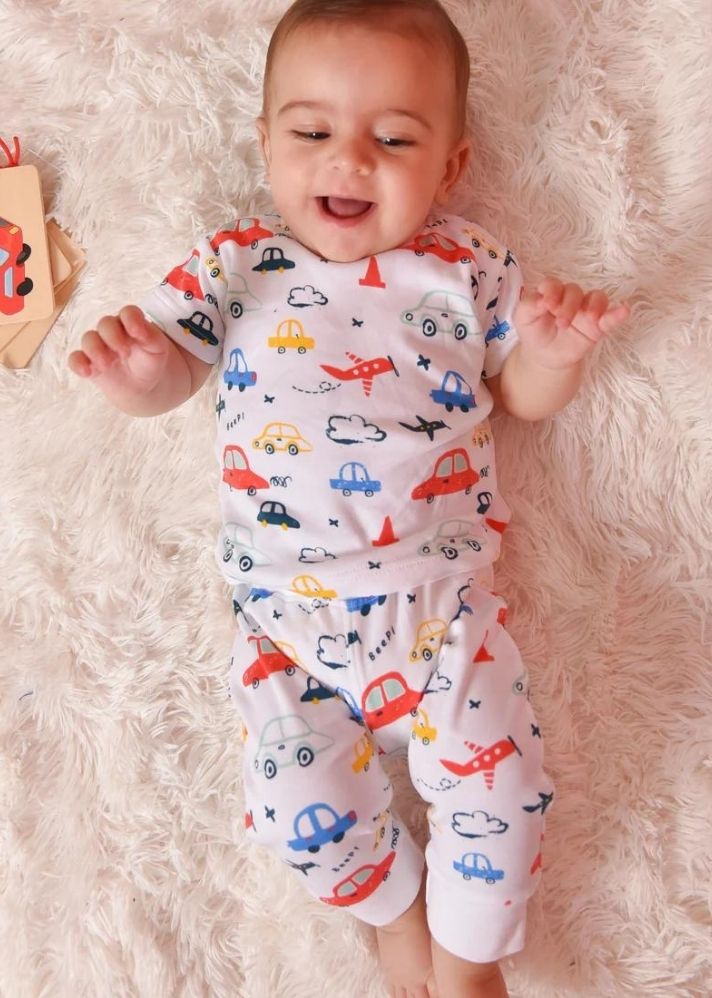 A Model Wearing Multicolor Organic Cotton Car And Plane Adventure Organic 2-Piece Pjs Set, curated by Only Ethikal